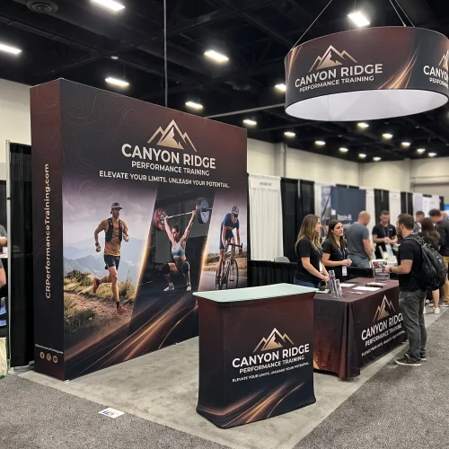 10ft x 10ft Fabric Pop Up Display with Endcaps displayed at an event